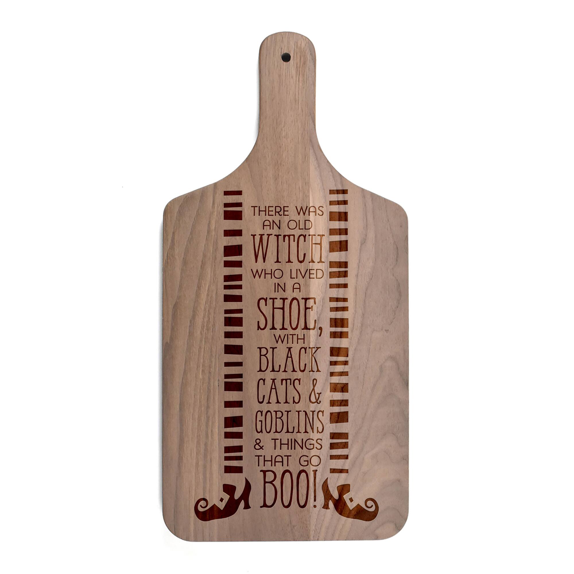 There was an Old Witch Walnut Paddle Cutting Board